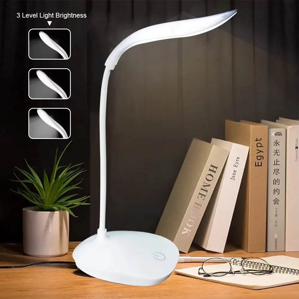 Modern white LED lamp on workspace